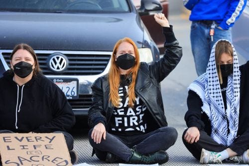Pro-Palestine activists halt traffic in US cities, causing disruption and tension between citizens. Source: pbs.org